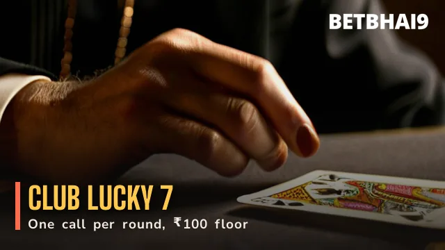 Betbhai9 Club dealer turning a single card beside one gold chip on coral felt