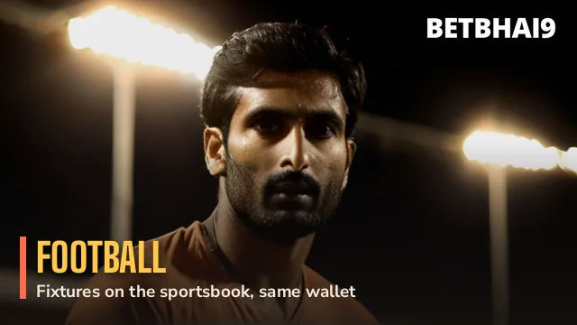 Footballer striking a ball under stadium lights on the Betbhai9 sportsbook card