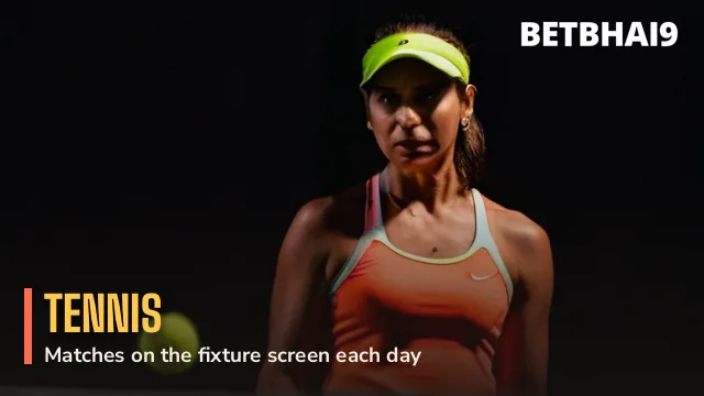 Tennis player serving on a floodlit night court for Betbhai9 tennis markets