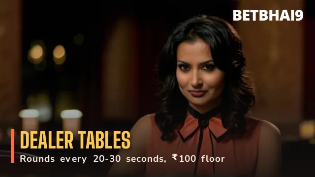 Betbhai9 Live dealer in a coral blouse welcoming players to a chip-stacked table