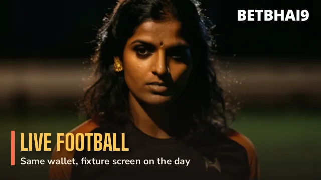 Footballer in a gold top controlling the ball on floodlit turf for Betbhai9 Live