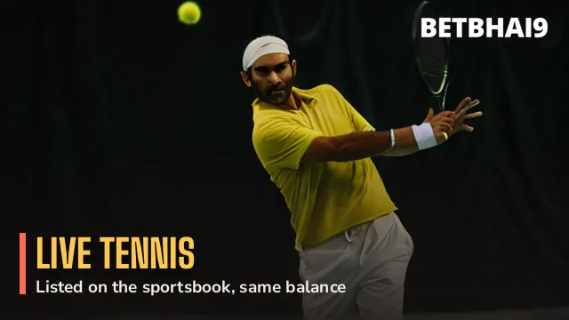 Tennis player hitting a backhand under night lights for Betbhai9 Live tennis